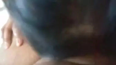 Semi-nude maid sucking dick like a pro