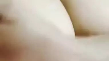 Desi woman in floral robe teases lover demonstrating big breasts