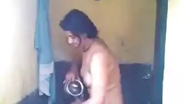 Mustached guy from India and girlfriend help take shower each other